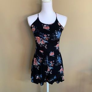 Black Floral Romper with Lace Detail on the Back